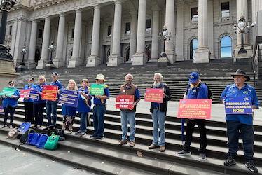 Members of clan protesting, photo by the ABC